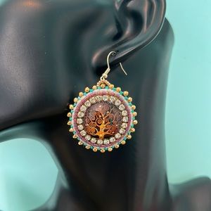 Beaded cab earrings.